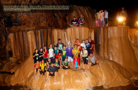 Spelunkers striking a pose at Sumaguing Cave