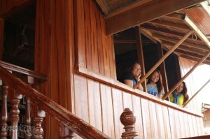 The ladies looking out of the window. Waiting for serenading suitors?