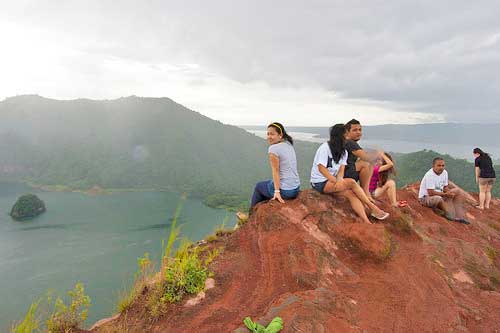 Wilade Quiando and other Brave folks sitting on edge of the ravine