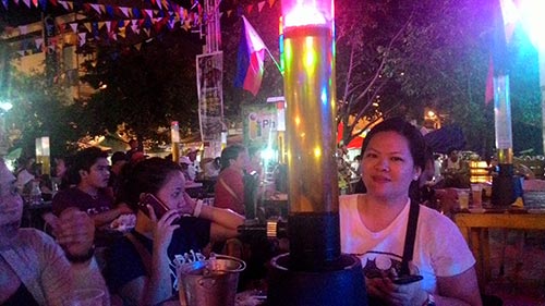 Having some shot at Iligan's Beer Plaza