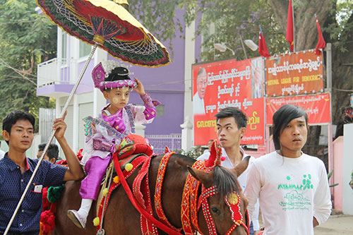 A parade of young Burmese boys in preparation of the Shinbyu or the novitiation ceremony in Nyaungshwe, an adjacent town of Bagan.