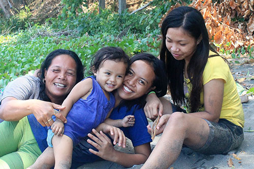 Our angel with her Mama (center), Lola (left), and Tita Mae Ann (right)