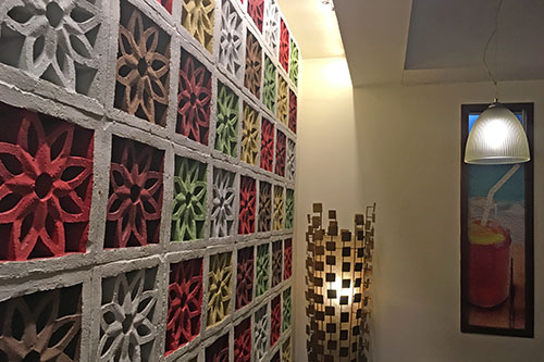 A colorful array of concrete patterns adorning Dong Juan's interior
