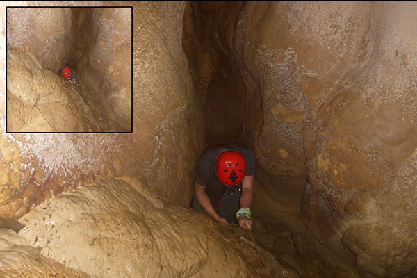 Roping down to the snake chamber of lower Langun Cave