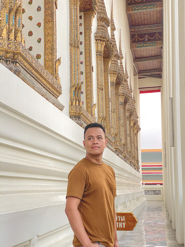 Outside the Temple of Reclining Buddha, Bangkok, Thailand Ian Limpangog at Wat Pho (temple of reclining Buddha), Bangkok, Thailand