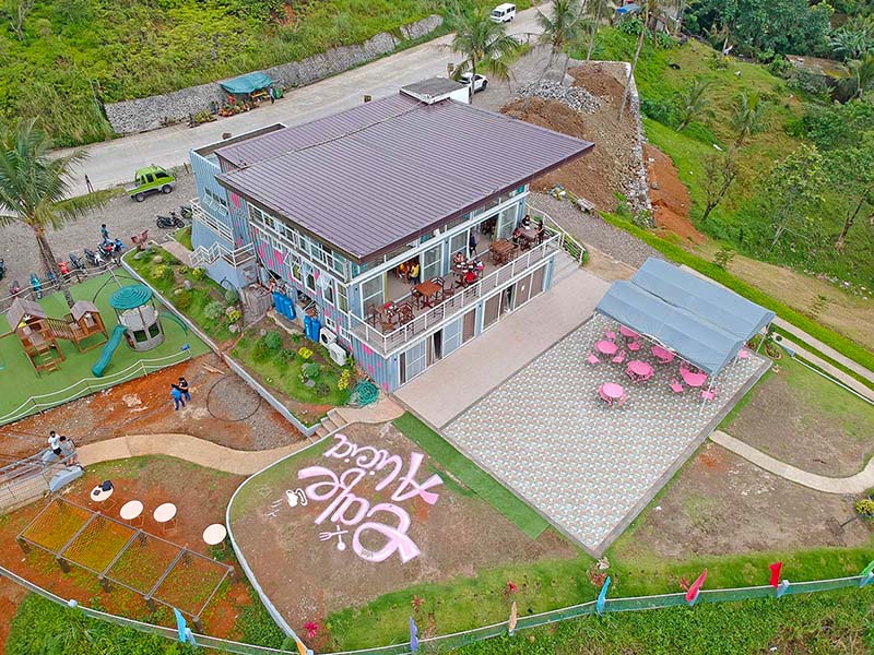 Then building housing both the restaurant and cafe