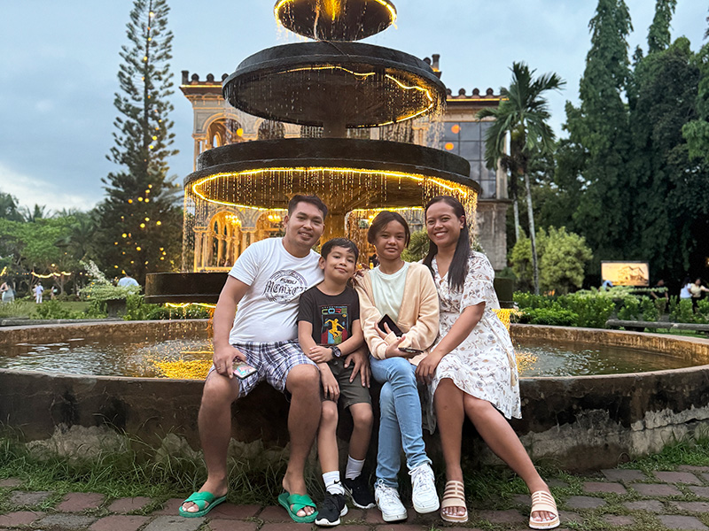 My sister's family at the fountain beside the Mansion