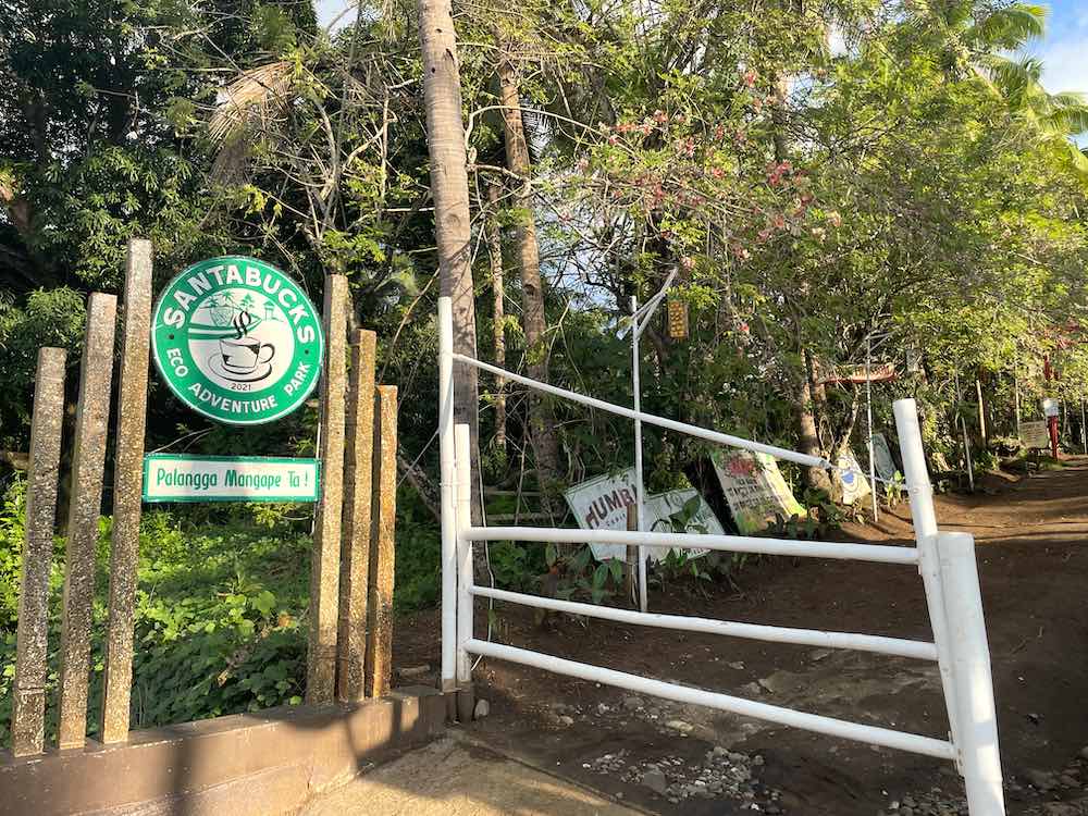 Santabucks Eco-Adventure Park entrance and road marker
